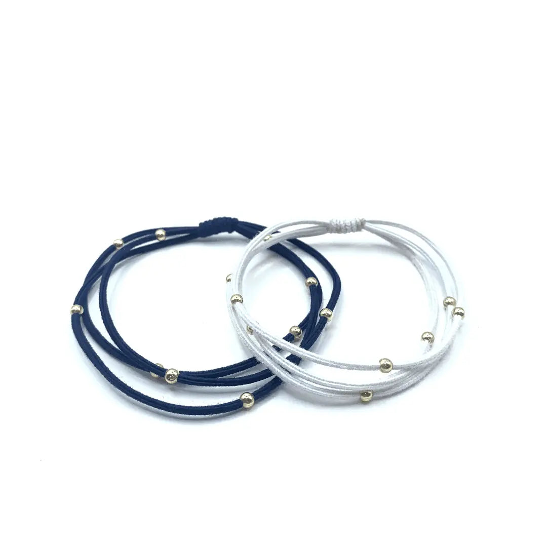 Erin Gray 3mm gold water pony waterproof bracelet hair bands in navy and white, versatile hair accessory for everyday wear.