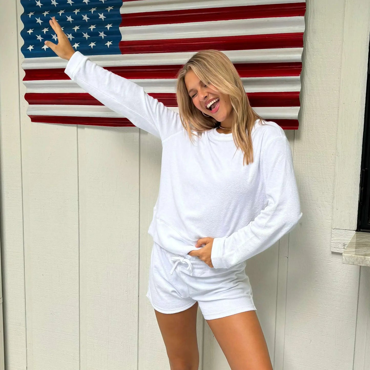 White Riviera plush toweling shorts by erin gray, casual pants with a relaxed fit and soft, textured fabric.