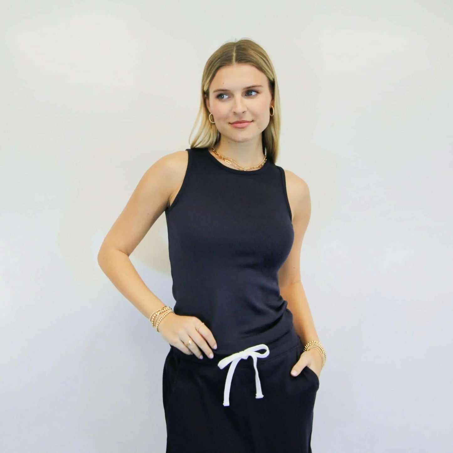 Navy Luxe Elevated Ribbed High Neck Tank top by erin gray, close-up of the ribbed fabric and high neckline.
