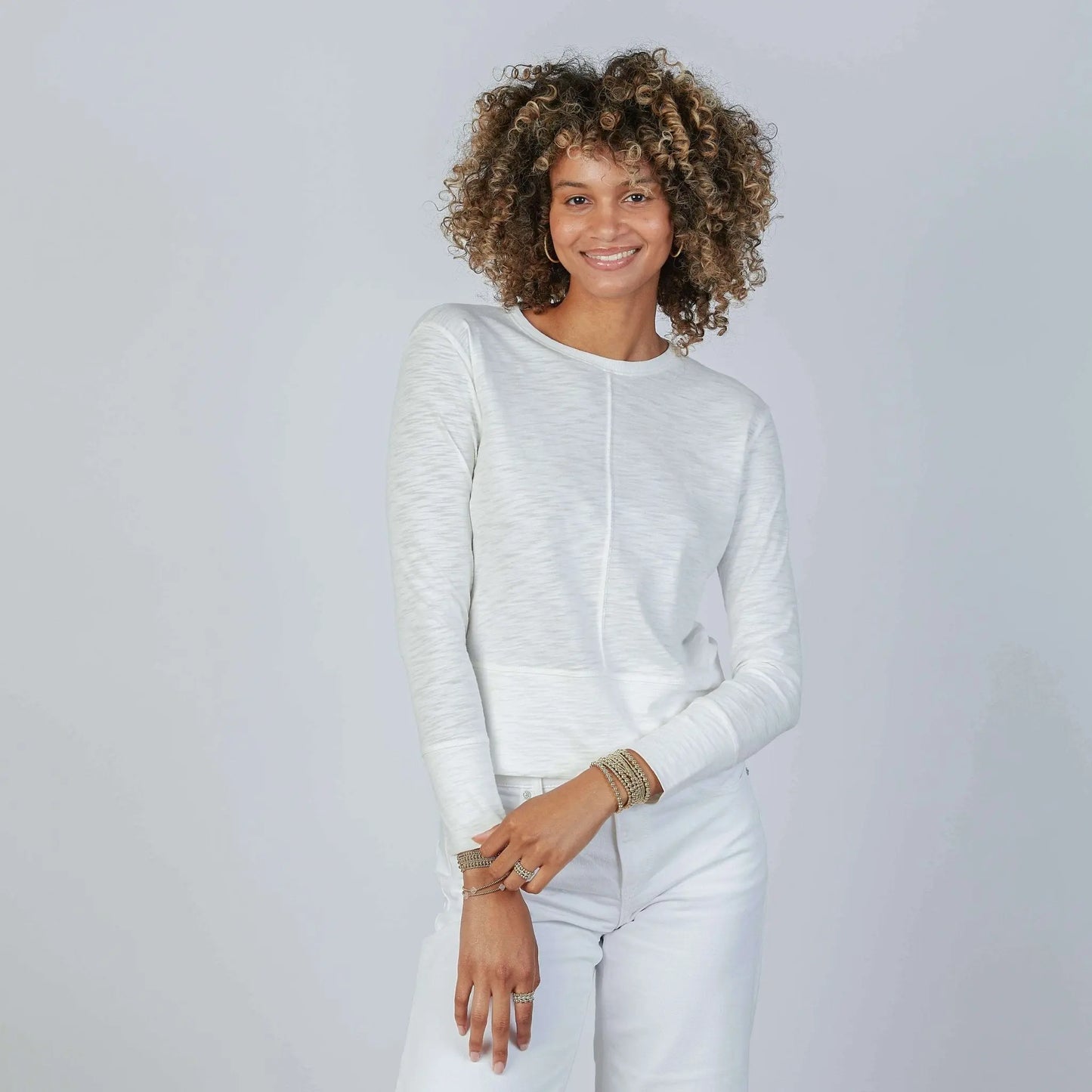 Long sleeve Celia Perfect Length Tee in ivory by erin gray, featuring a classic fit and soft fabric, shown on a model.