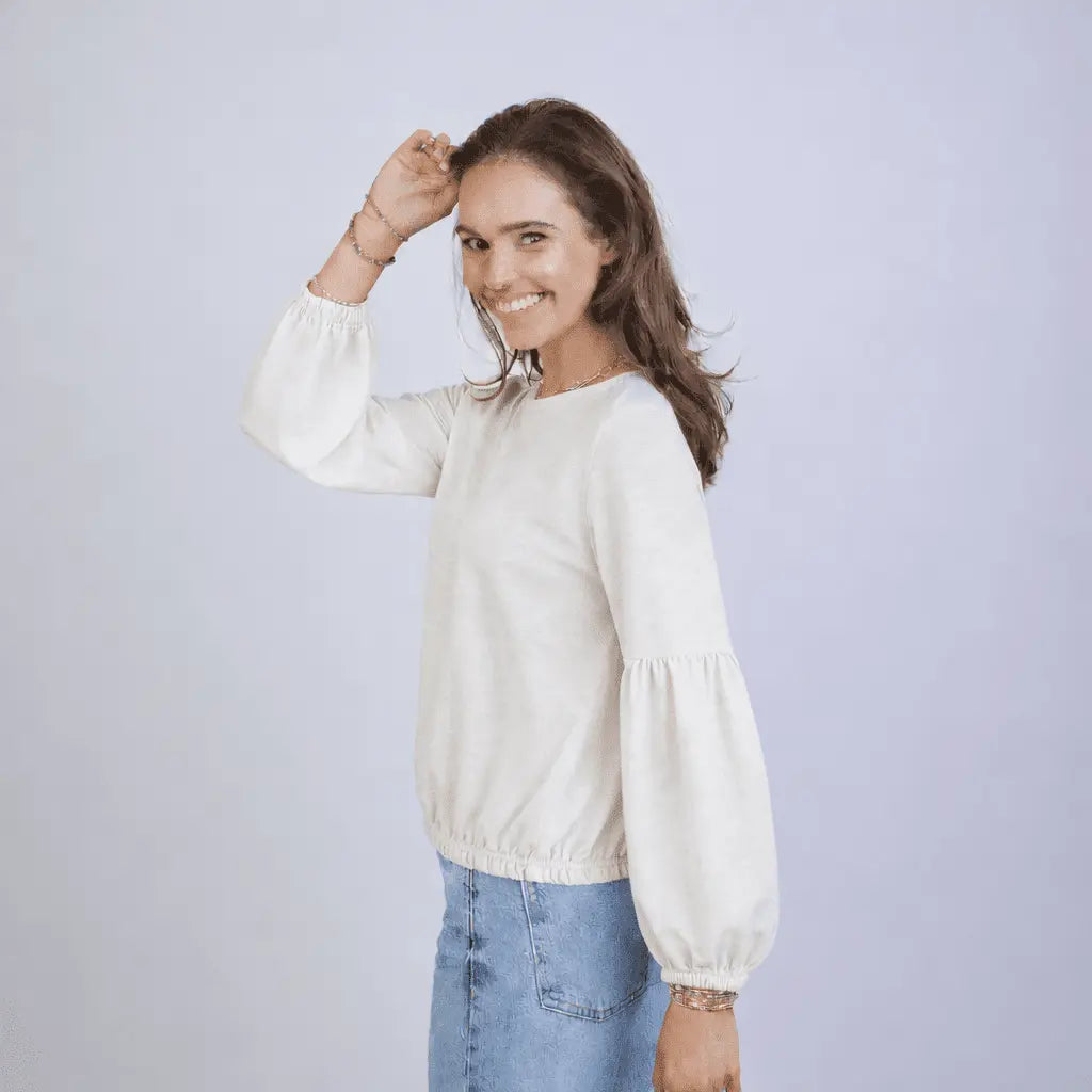 Ivory long sleeve English popover top by erin gray, featuring a relaxed fit and classic collar, styled with casual accessories.