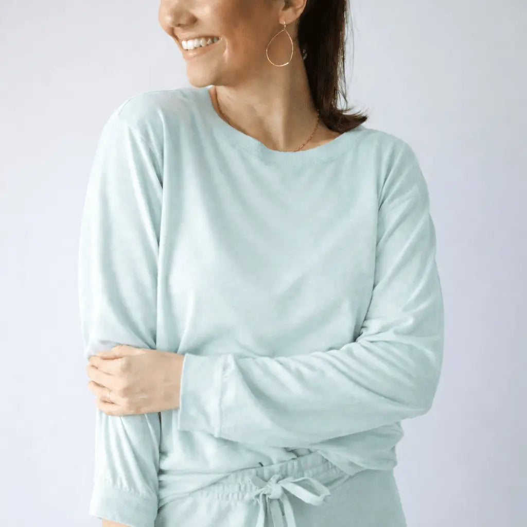 Long sleeve studio tee by erin gray in sea glass blue and white, featuring a relaxed fit and casual style.