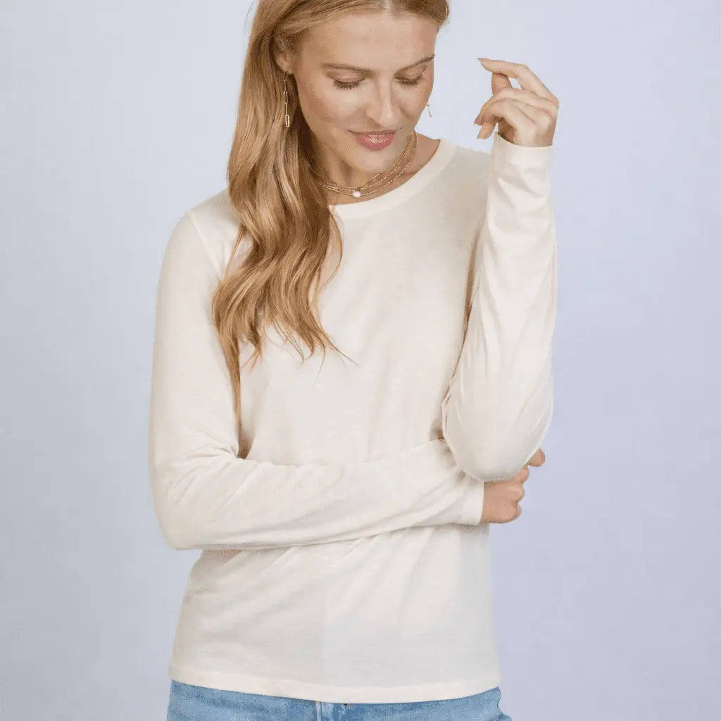 Long sleeve Weekender Tee in oyster color by erin gray, featuring a relaxed fit and soft fabric for casual comfort.