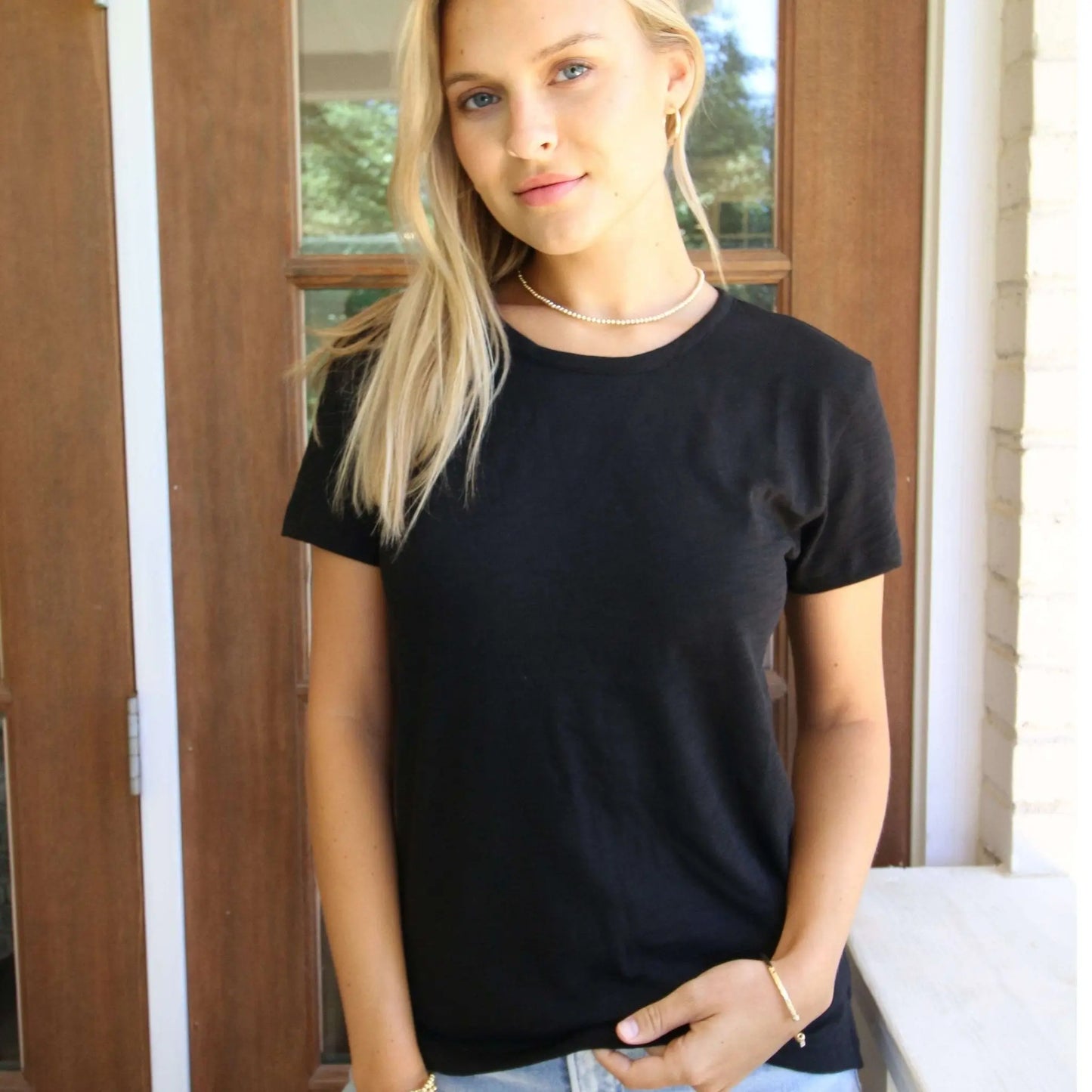 Black short sleeve jeans crew shirt by erin gray, featuring a textured slub fabric and casual fit.