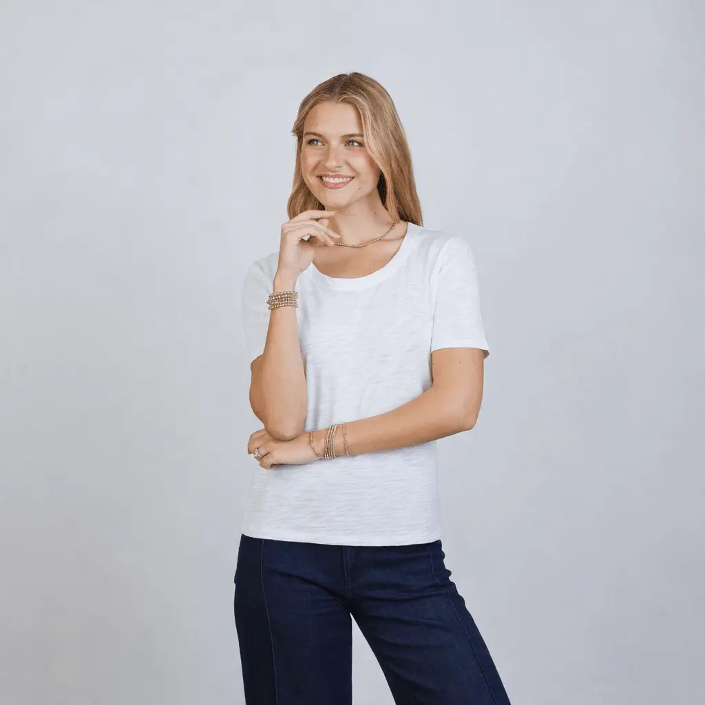 White Saturday short sleeve tee from erin gray, casual apparel with a classic fit, shown on a plain background.