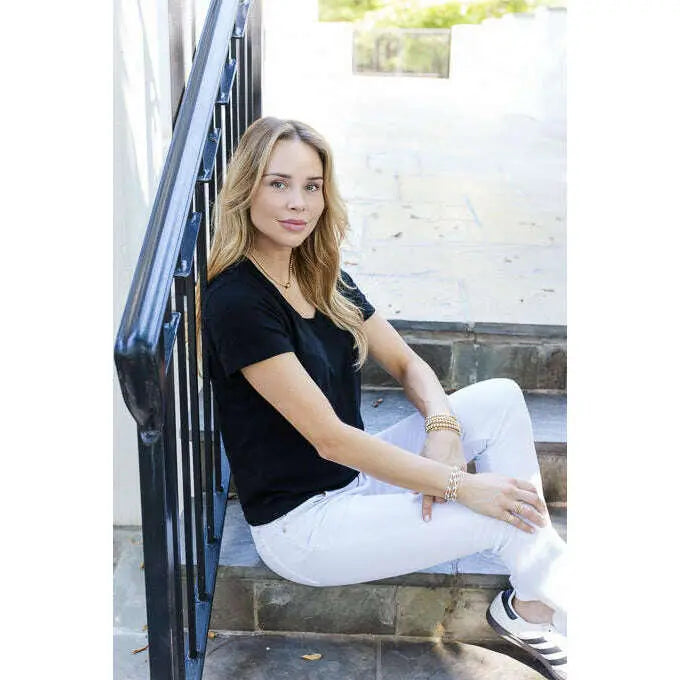 Black vintage low-key V-neck T-shirt from erin gray, featuring a classic relaxed fit and soft fabric.
