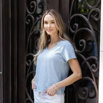 Vintage Low-Key V top in chambray by erin gray, featuring a relaxed fit and classic V neckline, shown on a model.