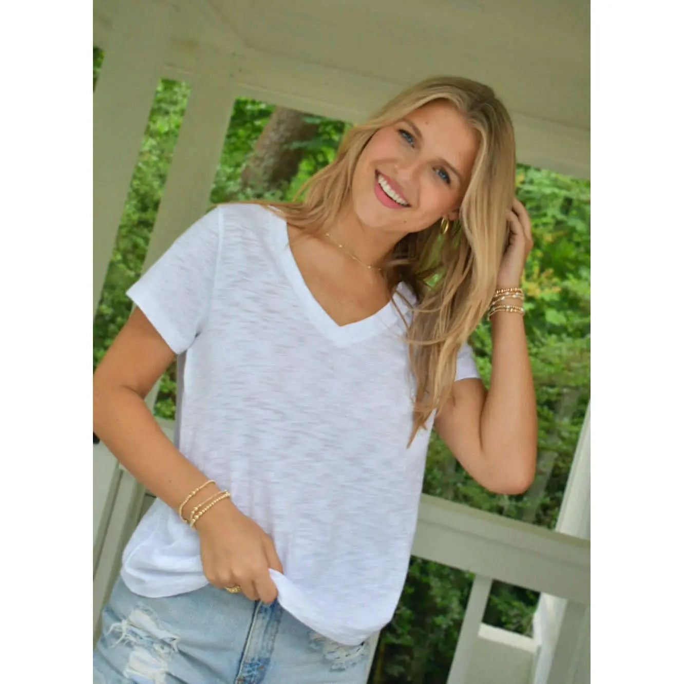 White vintage low-key V-neck T-shirt by erin gray, casual apparel with a relaxed fit and classic style.