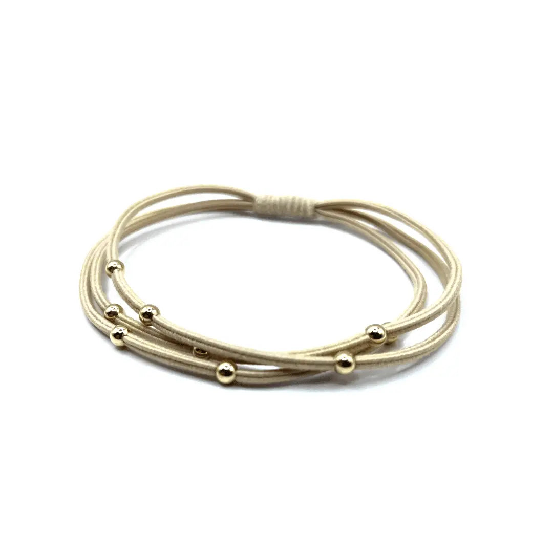 Beige erin gray Single Water Pony 3mm gold waterproof hair band, stylish hair accessory for secure, waterproof hair styling.