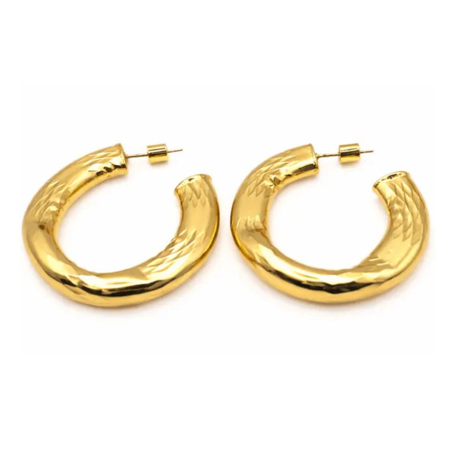 The Allure 38mm Brushed Gold Organic Hoop Earrings feature chunky, brushed gold hoops with a shiny, tarnish-resistant finish, displayed side by side on a white background.