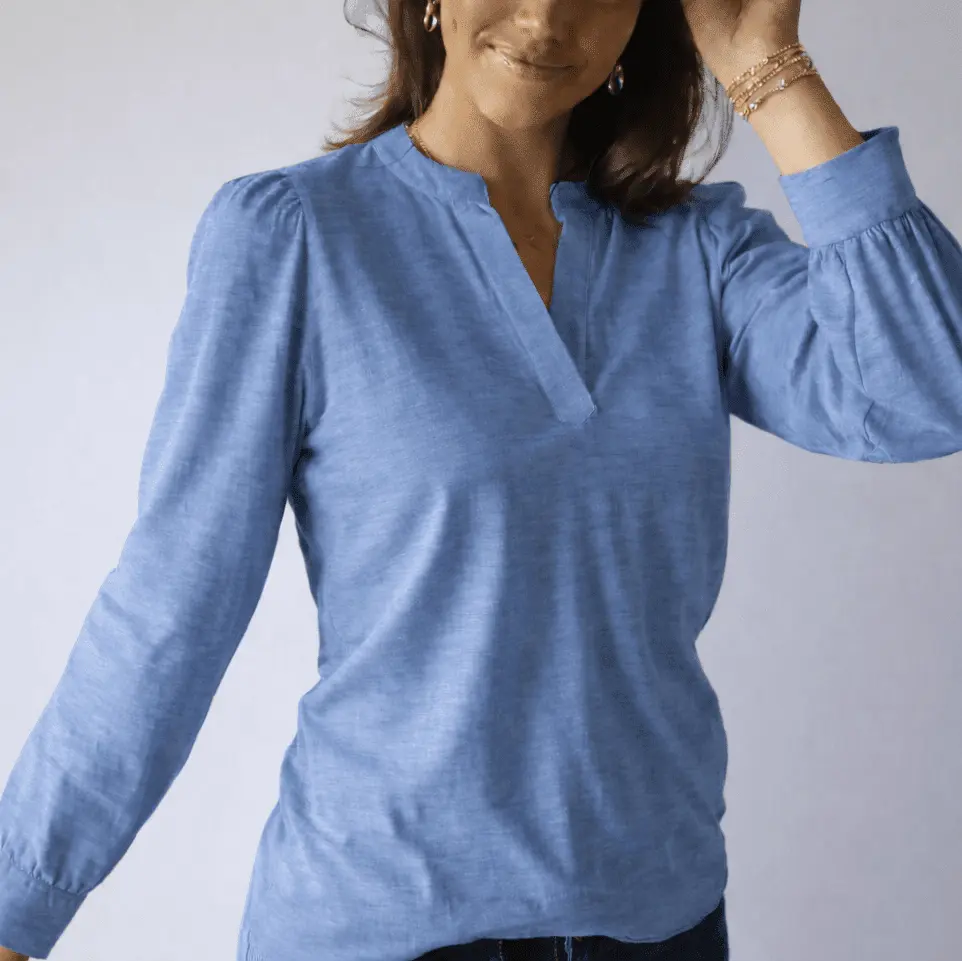 Denim blue Dolly Top by erin gray featuring long sleeves, casual women's apparel with a relaxed fit and stylish design.