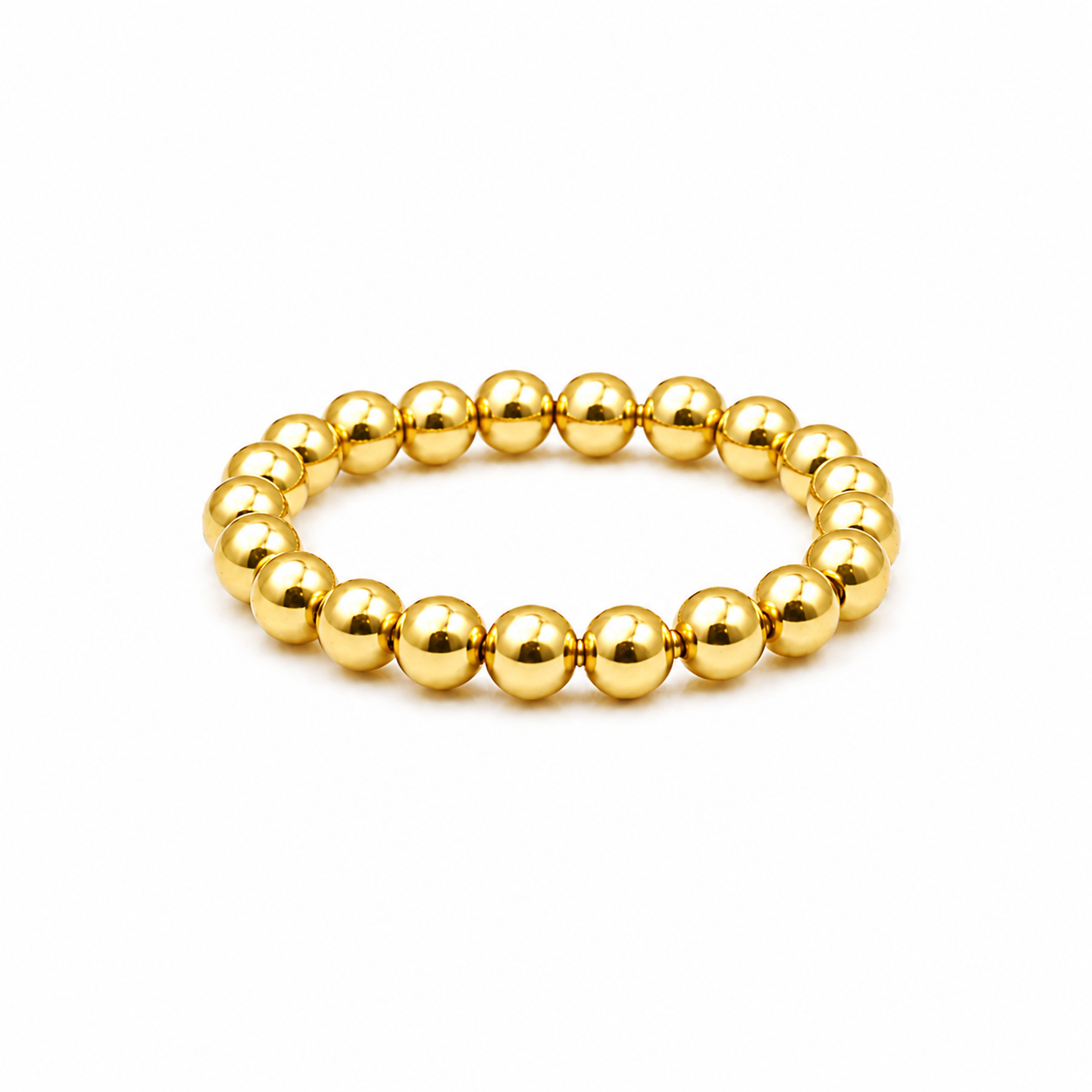 A gold beaded stretch bracelet with polished metallic spherical beads, shown on a plain white background.