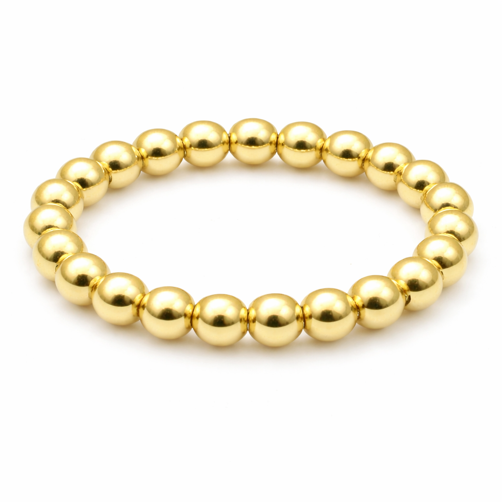 Gold filled 3mm waterproof stretch ring from erin gray jewelry, showcasing a smooth, shiny gold band on a plain background.