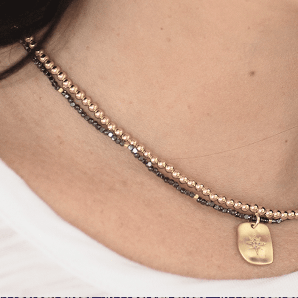 erin gray:Organic Starburst on Hematite Beaded Necklace