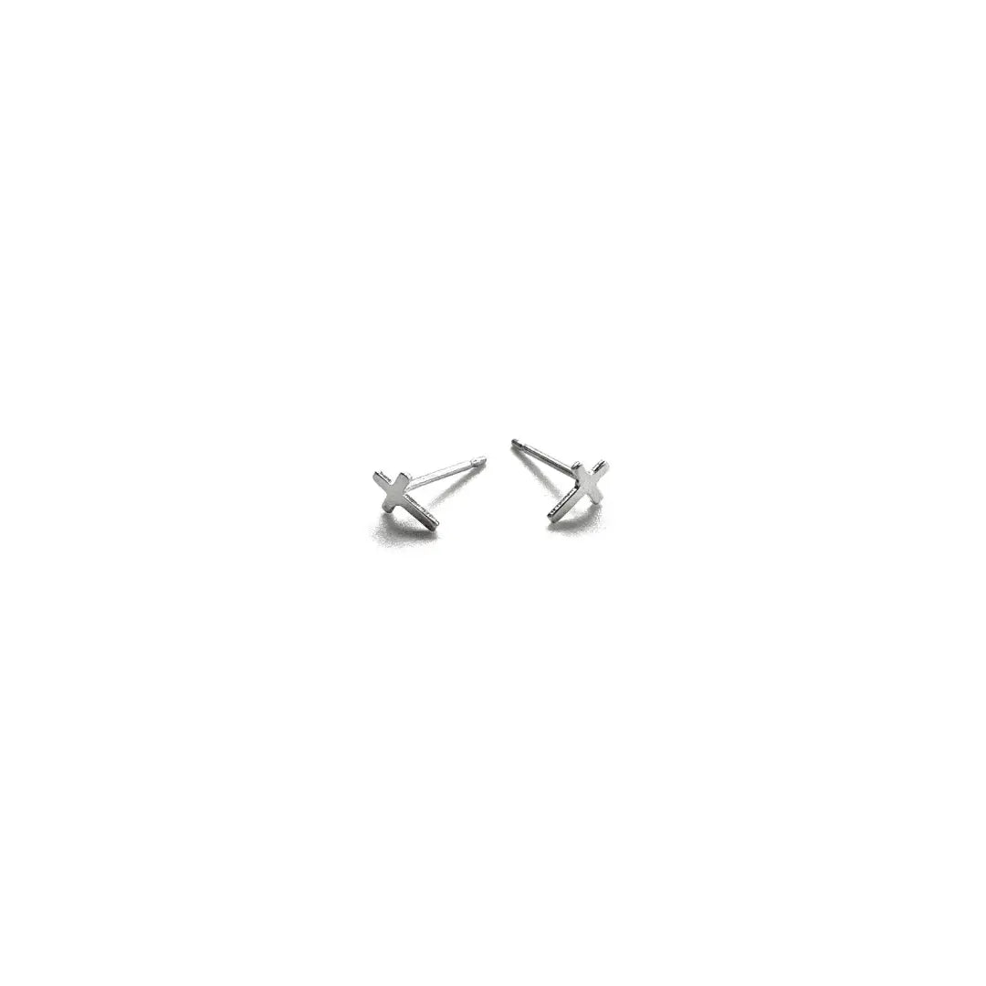Sterling silver teen stud earring featuring a tiny cross design by Erin Gray, ideal for subtle, stylish jewelry.