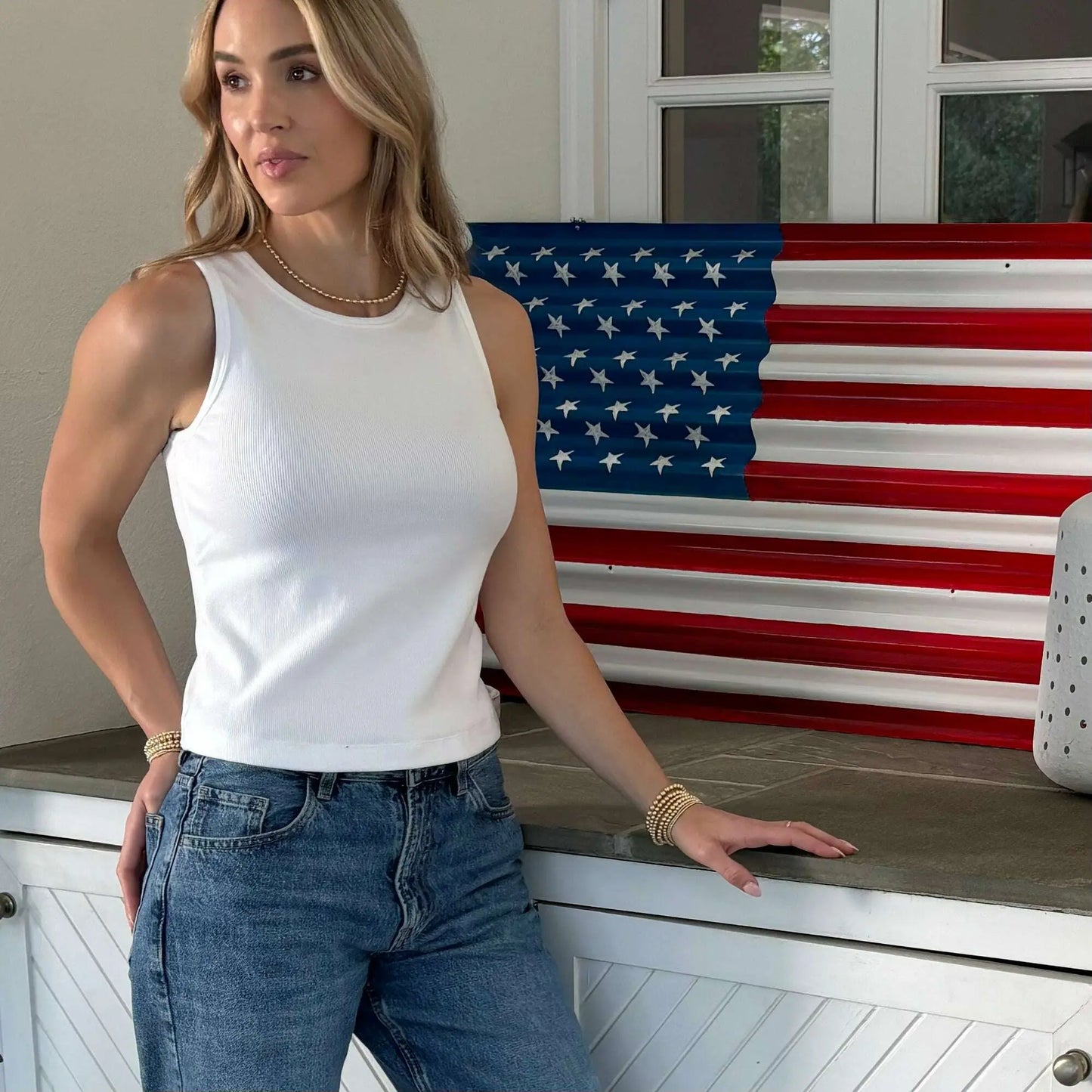 Ivory ribbed high-neck tank top from erin gray's Luxe Elevated Perfect Length collection, showcasing a fitted, stylish apparel design.