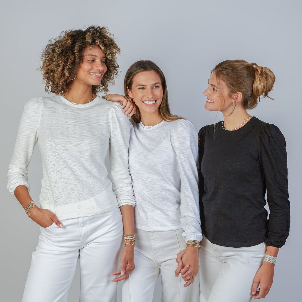 
                      
                        Joanie Subtle Puff Long Sleeve Tee w/Elastic Cuff in Black
                      
                    