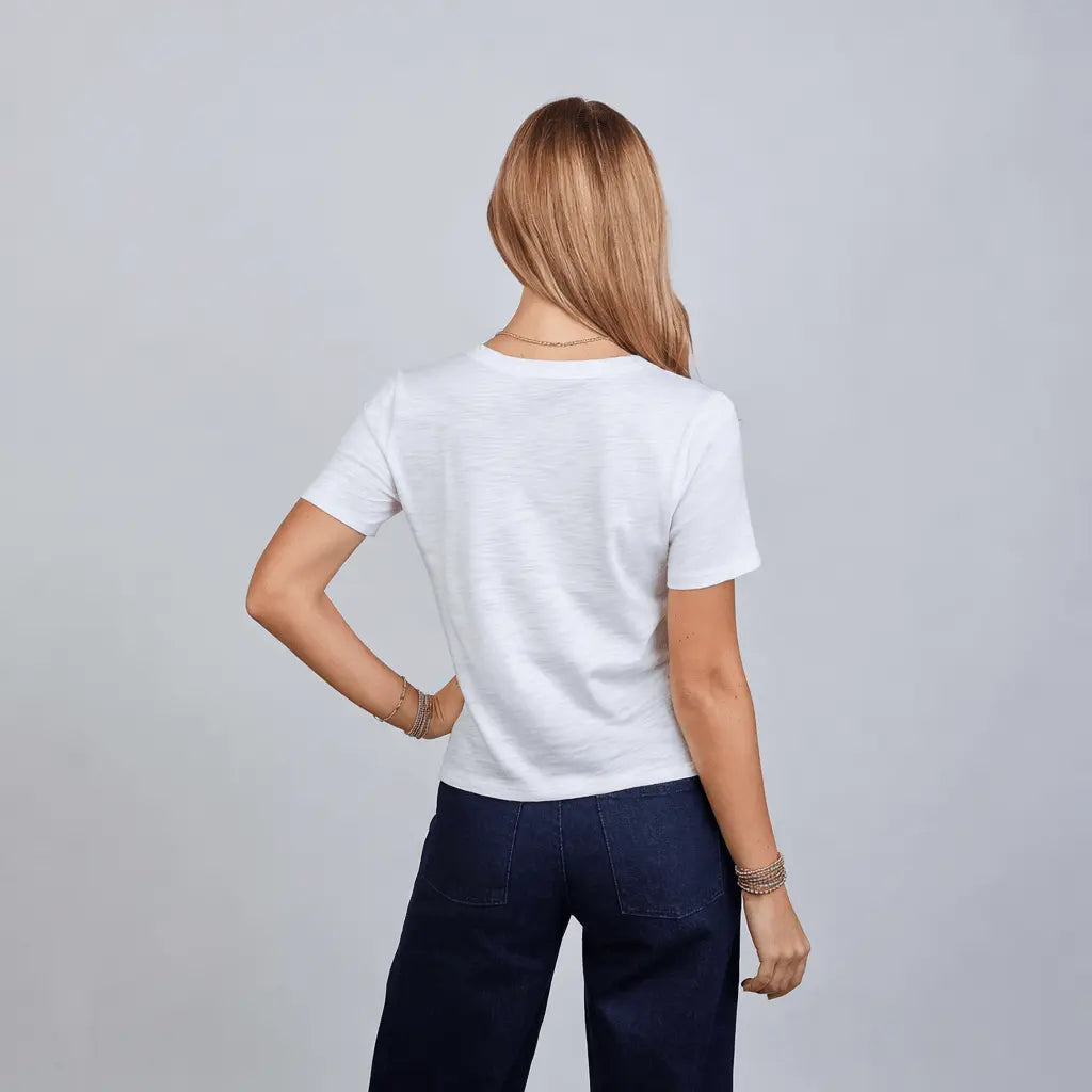 White Saturday short sleeve tee from erin gray, casual apparel with a comfortable fit and simple crew neckline.