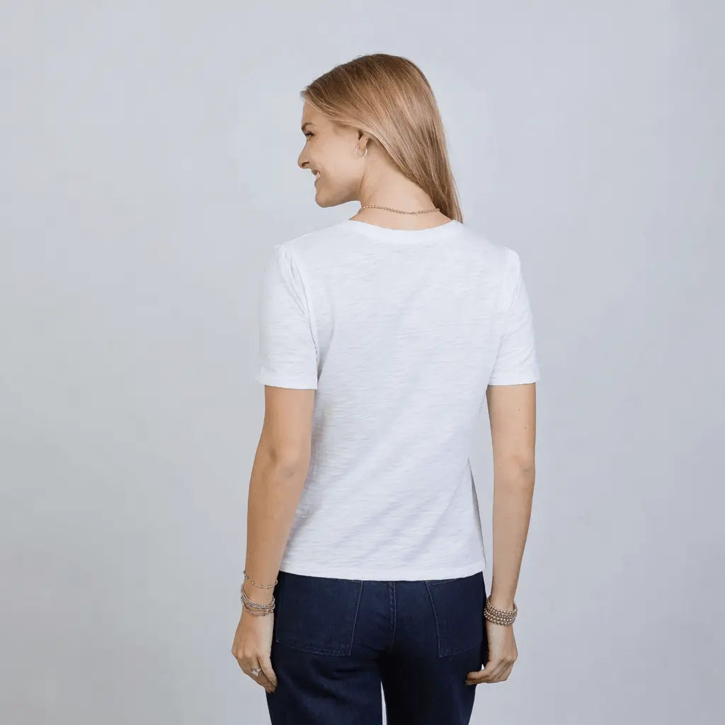 White Saturday short sleeve tee by erin gray, casual apparel with a crew neckline and relaxed fit, displayed on a plain background.