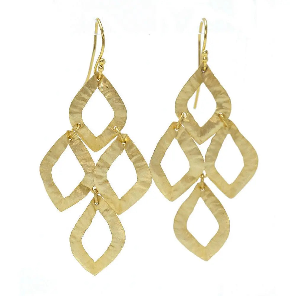 Gold foil Cabo Iris earring by Erin Gray featuring intricate jewelry design with a bold, artistic gold finish.