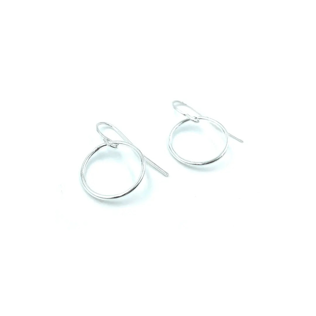 Sterling hoop earring from Erin Gray's Circle of Love jewelry collection, featuring a simple, elegant circular design.