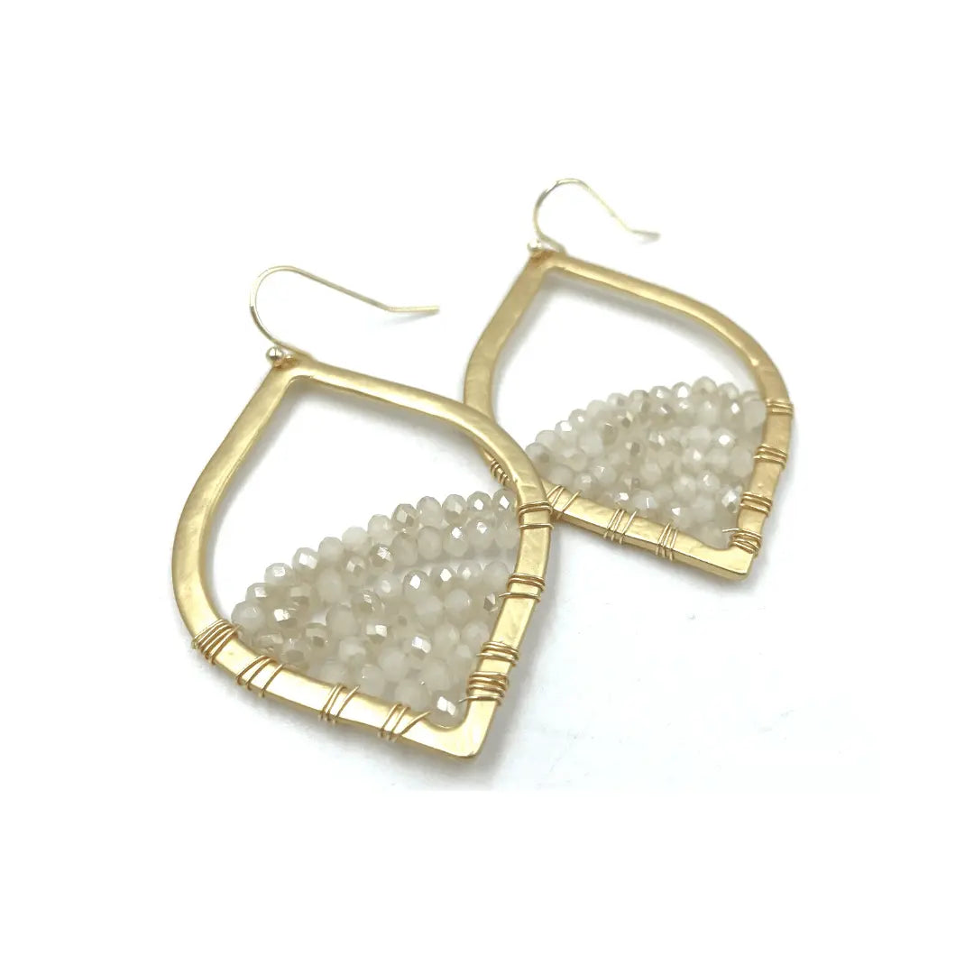 Elegant Stargaze earring in Pale Champagne by erin gray, featuring a sparkling jewelry design with a celestial-inspired aesthetic.