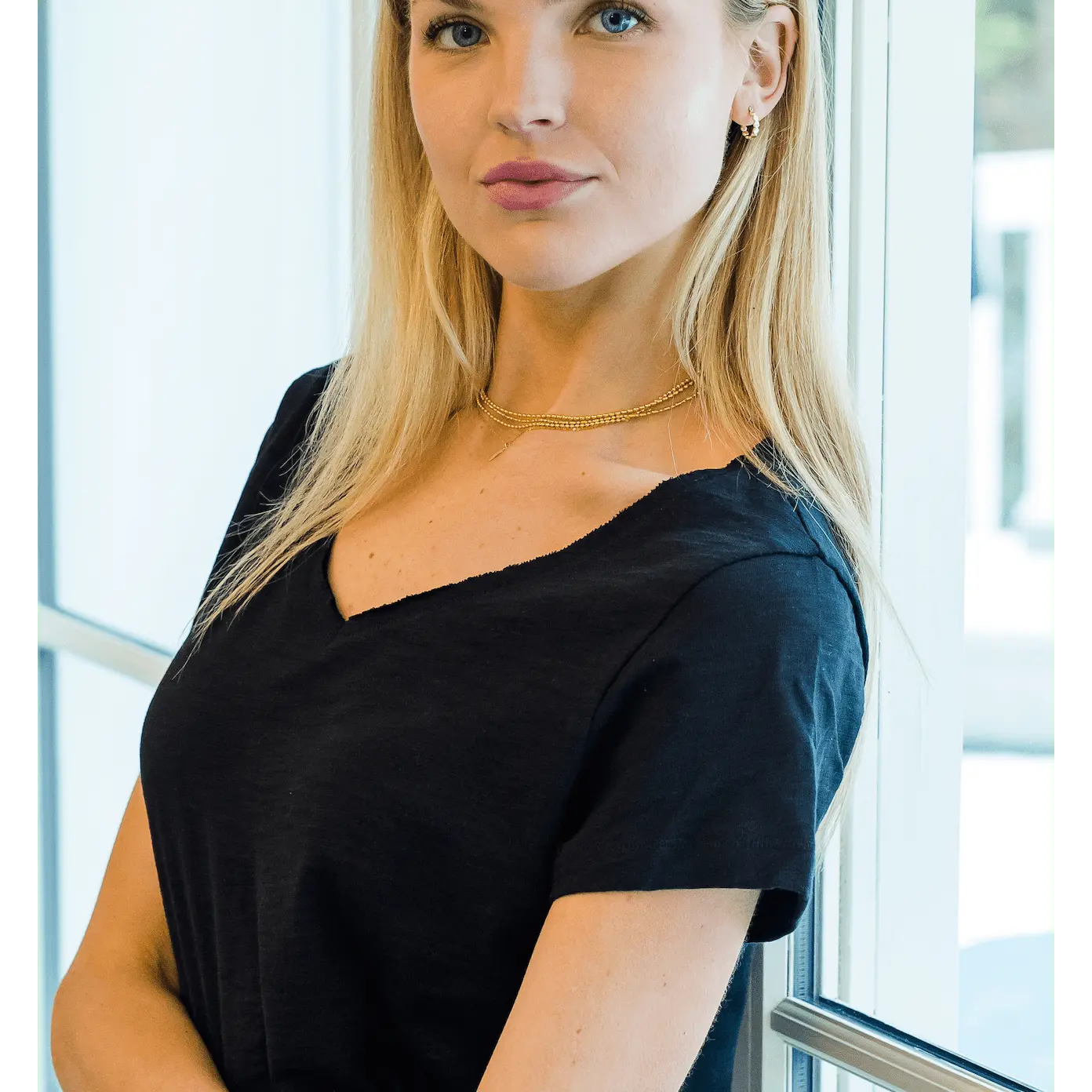 Black slub short sleeve V tee by erin gray, casual apparel with a relaxed fit and textured fabric.