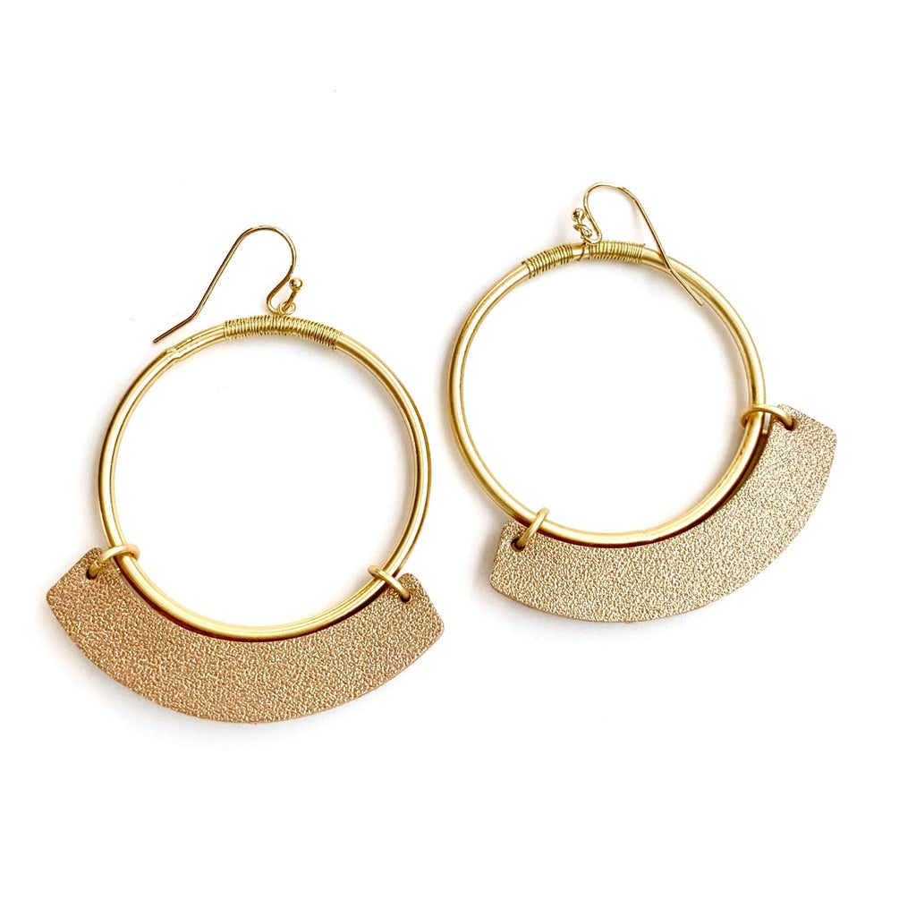 erin gray:Gold hoop and blush leather disco earring