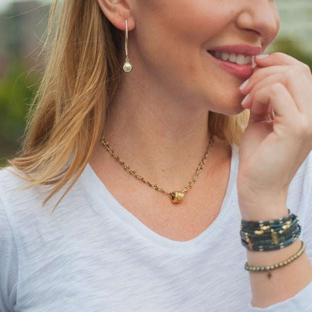 
                      
                        erin gray:Small Gold Barrel on Double Pyrite Necklace
                      
                    