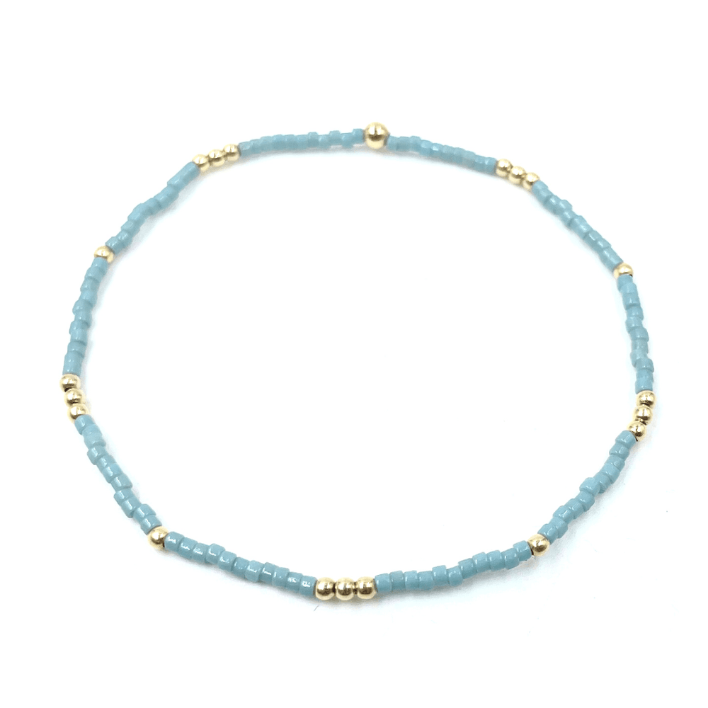 
                      
                        erin gray:2mm Newport PALE TURQUOISE Blue + Gold Filled Waterproof Bracelet
                      
                    